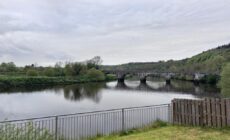 Behind The River